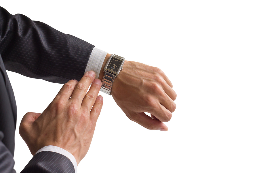 Man looking at watch